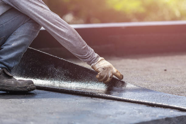 Professional Waterproofing technician working in Woodbine, GA